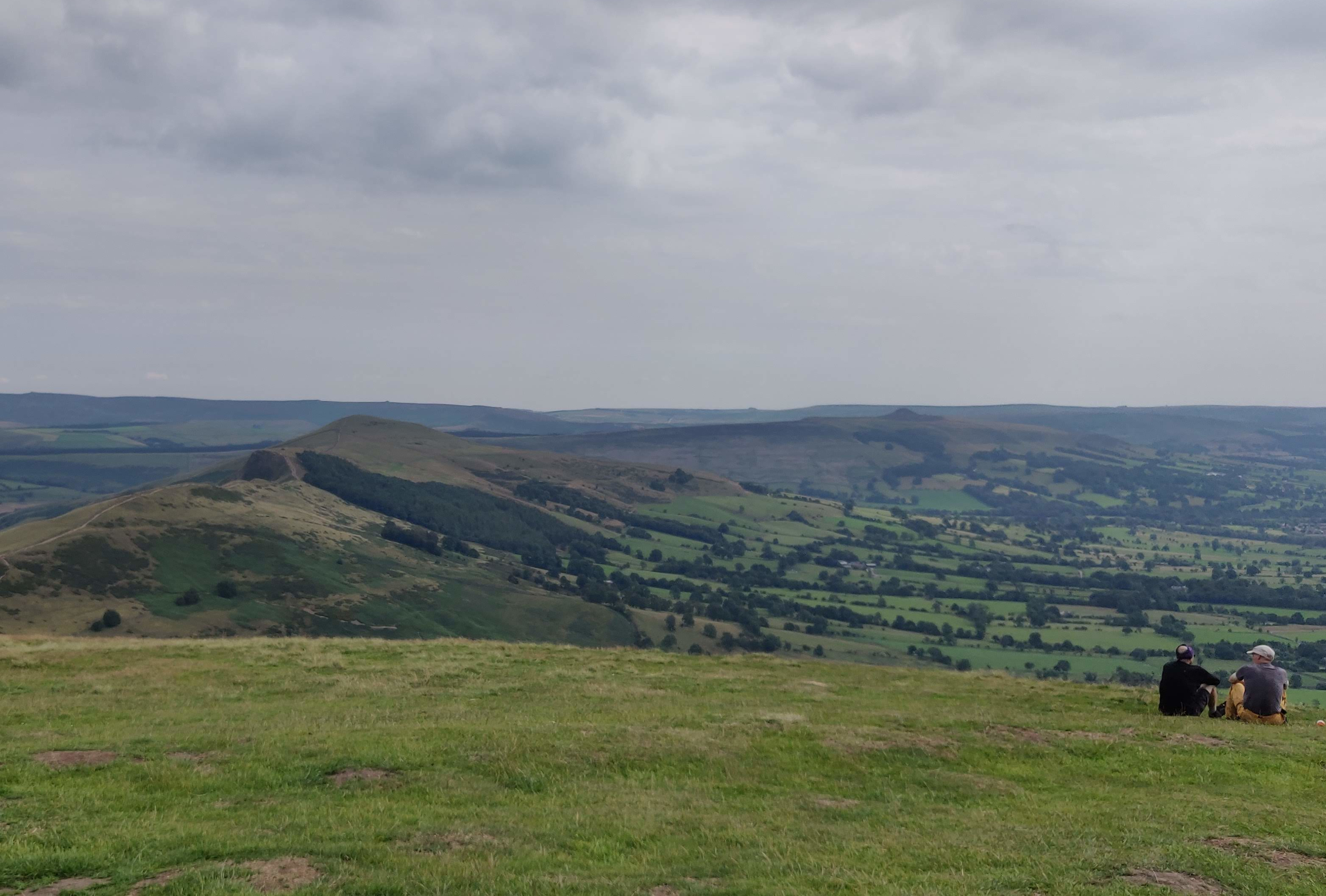 Looking along The Great Great at the top of Mam Tor on a partially cloudy day