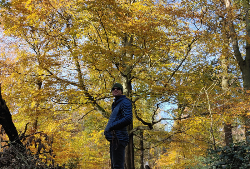 Autumn leaves in Clumber Park with Kial with down jacket and sunglasses